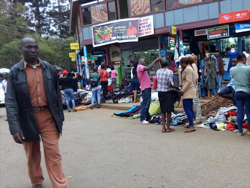 Hawkers selling their wares in the streets of Thika town on Jan 30, 2018.