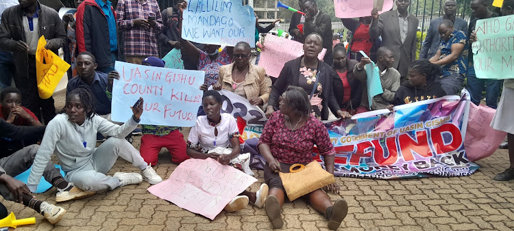 Parents and some of the students affected by the Finland education scam during protests in Eldoret on August 2, 2023.