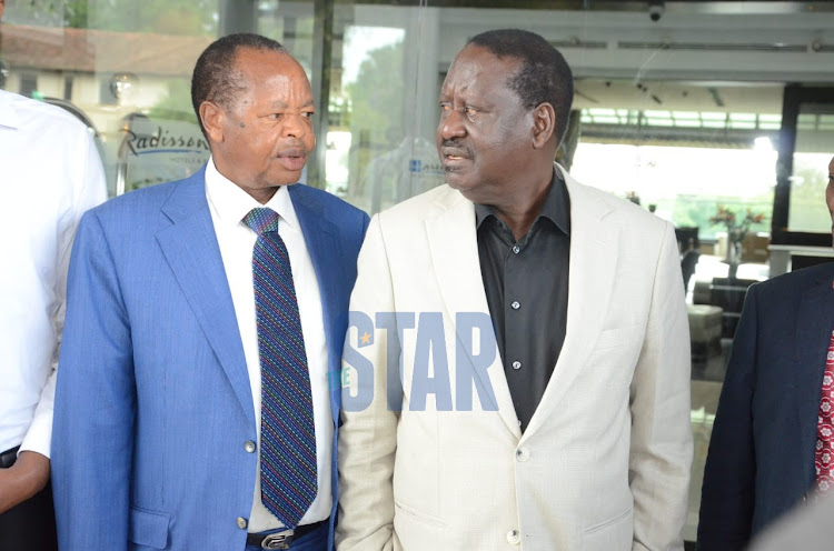 Nyeri Senator Ephraim Maina (Nyeri) with ODM leader Raila Odinga at the Radisson Blue Hotel in Nairobi on Thursday, January 23, 2020.