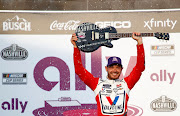 Kyle Larson, driver of the #5 Valvoline Chevrolet, celebrates iafter winning the NASCAR Cup Series Ally 400 at Nashville Superspeedway on June 20  2021 in Lebanon, Tennessee.