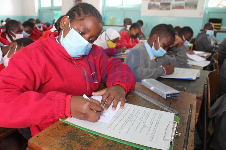 Grade five pupils sit for mathematics paper during start of Kenya National Examinations Council (KNEC) assessment tests at Nairobi Primary School on February 1, 2022/ANDREW KASUKU