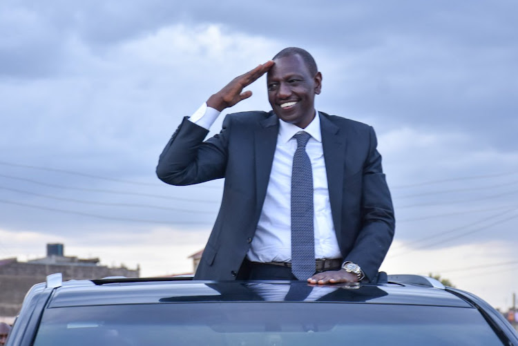 Deputy President William Ruto acknowledges greetings from residents on his way to Nairobi from Murang'a County on March 4, 2019.