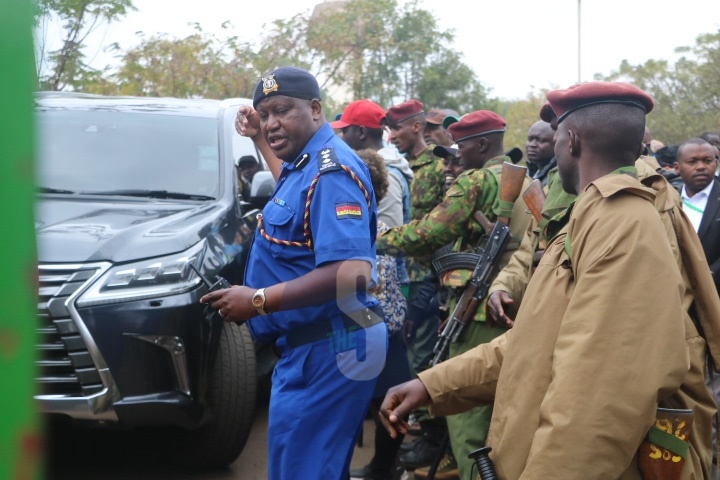 Security police officers directing Nairobi governor elect Johnson Sakaja where to pack his car as he was driving himself to Kasarani Tallying Centre to collect his certificate on Sunday, August 14, 2022.