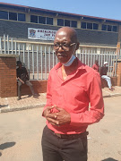 Bishop Tekane Matome prayed for peace outside the school.