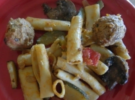 This is a great summer dish--fresh tomatoes, fresh zucchini, fresh onions--a summer festival of tastes! I added 12 oz. of Italian style meatballs and they were great!