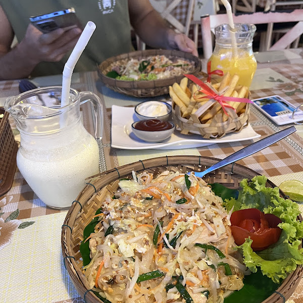 Pad thai, fries, coconut shake