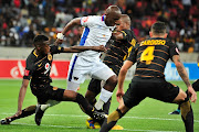 Mark Mayambela of Chippa United surrounded by Chiefs defenders during the Absa Premiership 2017/18 game between Chippa United and Kaizer Chiefs at Nelson Mandela Bay Stadium in Port Elizabeth on 6 December 2017.