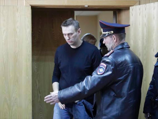Russian opposition leader Alexei Navalny attends a hearing after being detained at the protest against corruption and demanding the resignation of Prime Minister Dmitry Medvedev, at the Tverskoi court in Moscow, Russia March 27, 2017. /REUTERS