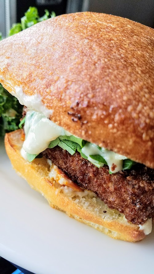 Ecliptic Brewery's vegetarian/vegan option to their burgers - this Farro Burger with a wheat-garlic patty, tahini, arugula, spicy pickled carrots