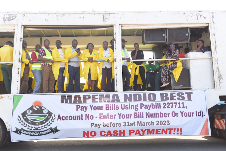 Kirinyaga county senior officials led by CEC member for finance Jackeline Njogu in a campaign for business owners pay their revenues using the cashless system