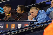 Manchester City's Erling Haaland is seen on the bench after being substituted in their Champions League quarterfinal second leg against Real Madrid at Etihad Stadium in Manchester on Wednesday.