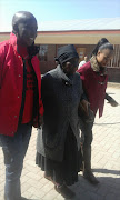 Julius Malema with his grandmother and his wife Mantoa