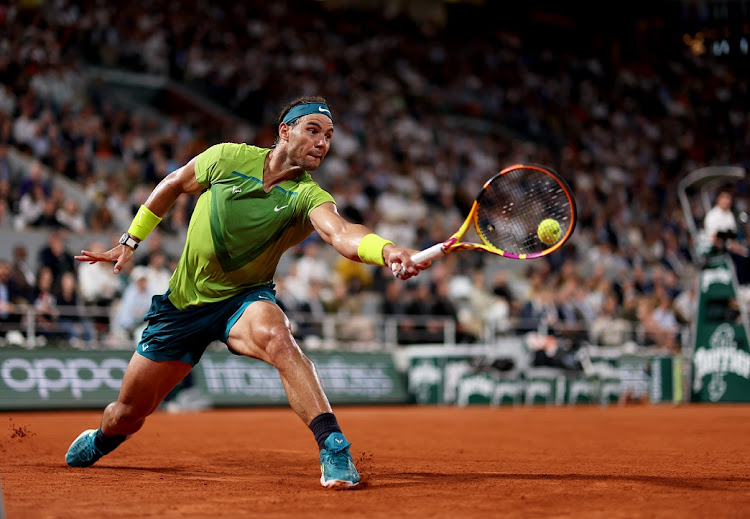 Rafael Nadal of Spain plays a backhand against Alexander Zverev of Germany in their French Open semifinal at Roland Garros in Paris on June 3 2022.