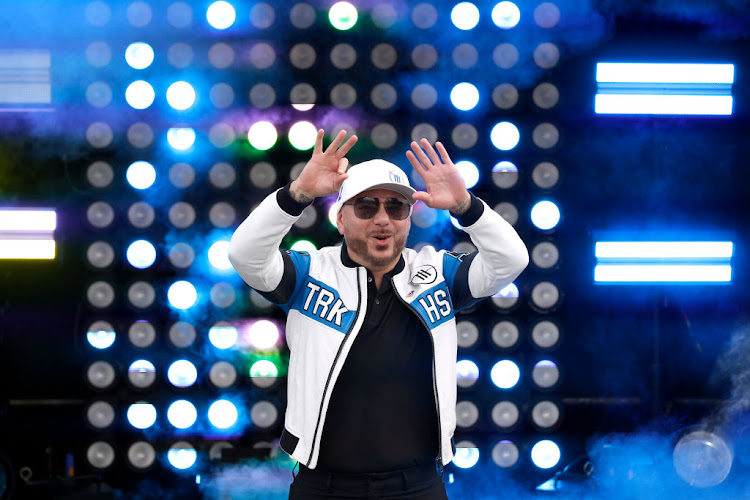 NASCAR's Trackhouse Racing, co-owned by rapper Pitbull (pictured), announced on Tuesday they will enter MotoGP next year in partnership with Aprilia as replacements for the dropped RNF Racing team.