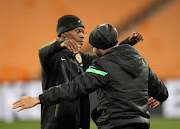 Arthur Zwane and Dillon Sheppard, joint coaches of Kaizer Chiefs celebrate their victory against Golden Arrows. File photo.