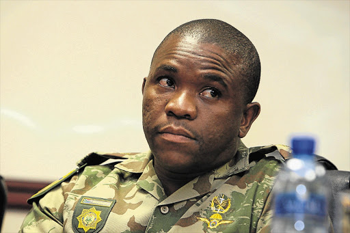 Lieutenant-general Nhlanhla Mkhwanazi at a press conference yesterday after his appointment this week as acting national police commissioner. His raised rank was not formally announced.