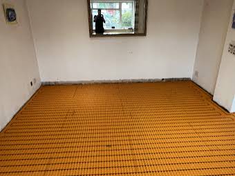 Electric underfloor heating install. album cover