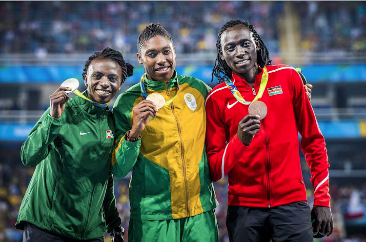 Burundi's Francine Niyonsaba (L) with Kenya's Margaret Nyairera (R) and South Africa's Caster Semenya during the 2016 Rio Olympic Games