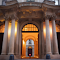 Item logo image for The entrance to a building with columns and arches