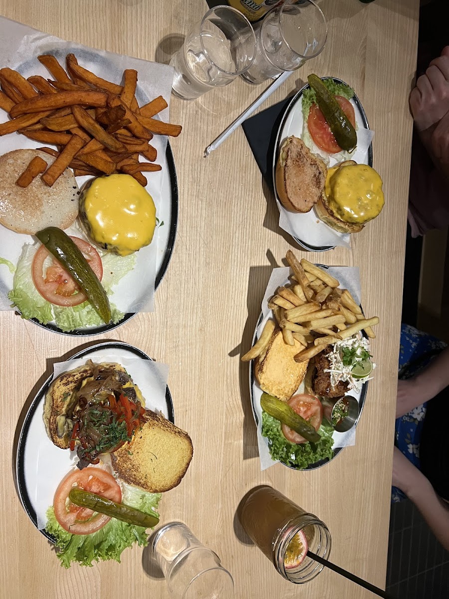 The Burger on the left with the sweet potatoes are gluten-free