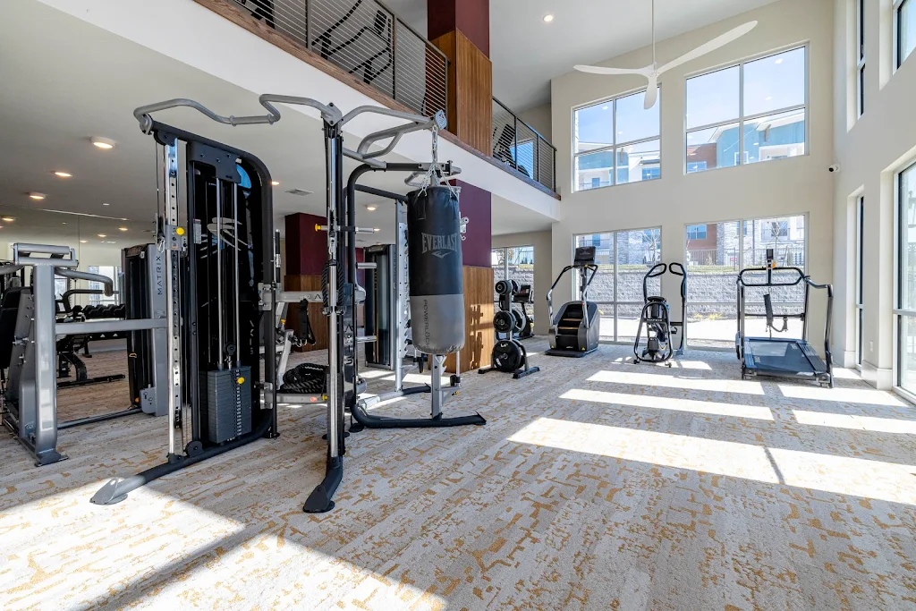 Expansive two-story fitness center with cardio, weights, and other high-end equipment