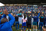 Maritzburg United players applaud thier fans after a match at Harry Gwala Stadium in Pietermaritzburg. 