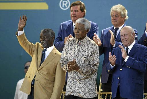 Front: Rupert, pictured here in 2003 with Thabo Mbeki, Nelson Mandela, FW de Klerk. Back: Johann Rupert, chairman of the Sunshine Tour, and German businessman Hasso Plattner, says Mbeki understood his family businesses. Picture: Sunday Times/Raymond Preston