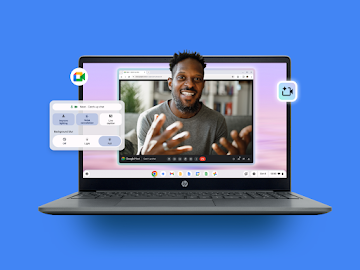 A man smiles during a Google Meet call that is displayed on an open Chromebook's screen.