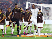 Bafana Bafana celebrate the first goal against Morocco by performing the viral Skomota dance challenge on Tuesday. 