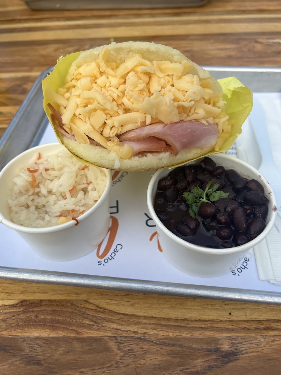 ham and cheese arapa with black beans and rice as sides