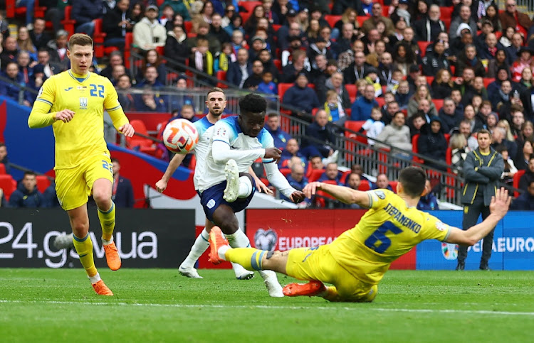 England's Bukayo Saka scores against Ukraine. Picture: CARL RECINE/REUTERS