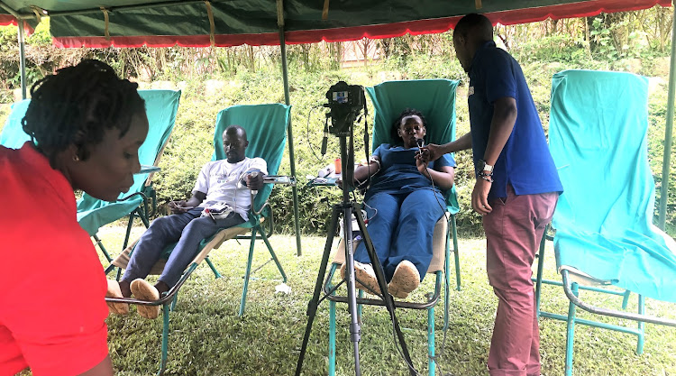 Staff at Le Memorial Hospital donating blood at the hospital premises in Kitko Lubowa off Entebbe road