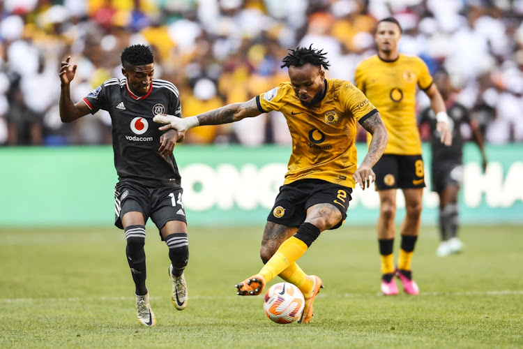 Monnapule Saleng of Orlando Pirates and Edmilson Dove of Kaizer Chiefs during the DStv Premiership match between Kaizer Chiefs and Orlando Pirates at FNB Stadium on February 25, 2023 in Johannesburg.