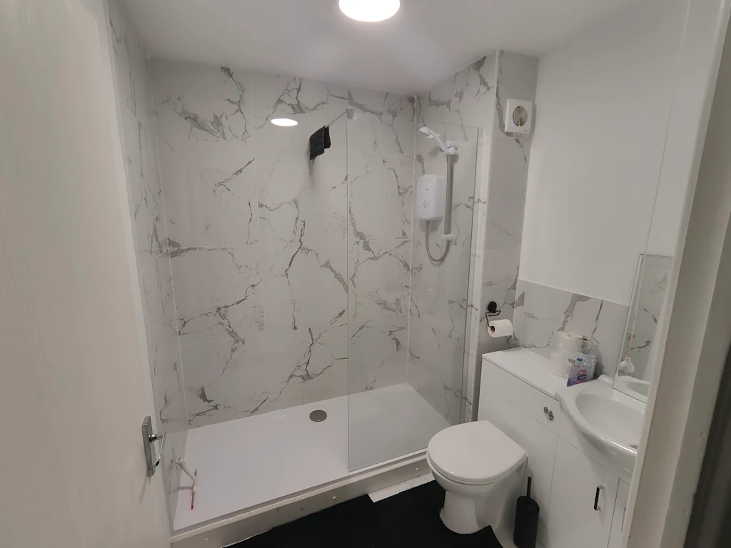 Album cover: Shower tray replaced with bath + few bits