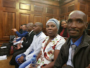 From right: James, Rosina and Lucas Komape were in court on Monday for the hearing.   