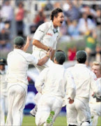 HERO: Spinner Paul Harris takes the wicket of Peter Siddle enroute to his maiden fiver against Australia at Sahara Park Newlands in Cape Town yesterday. 22/03/2009. Pic. Duif du Toit. © Gallo Images.