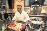 PASSIONATE: Masterchef contestant Deena Naidoo in his kitchen, which he built himself