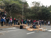 Students protest over poor living conditions and security issues at the University of KwaZulu-Natal's Westville campus on August 17 2018.