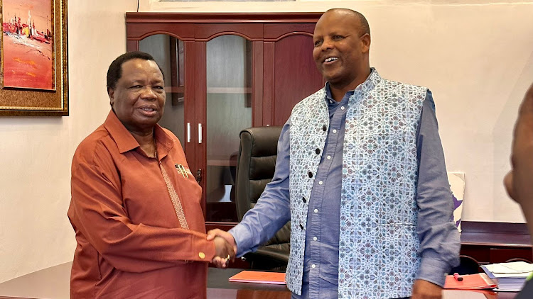 COTU (K) SG Francis Atwoli and NSSF Managing Trustee David Koros during a consultative meeting between Cotu and NSSF in Kisumu on December 9, 2023