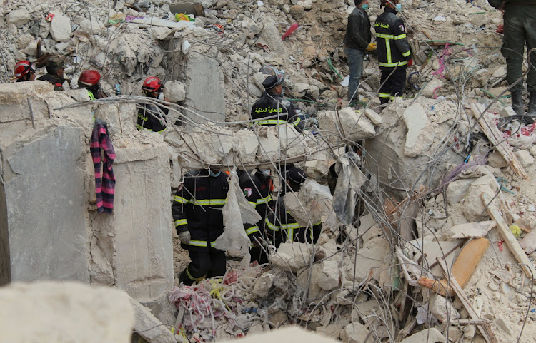 Members of the Algerian rescue team search for survivors at the site of a damaged building, in the aftermath of the earthquake in Aleppo, Syria, ON February 8 2023. Picture: FIRAS MAKDESI/REUTERS