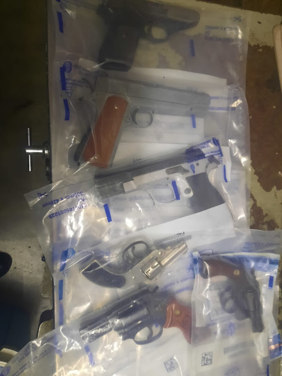 Four suspects are under arrest after they were found in possession of firearms, an elephant tusk and a large quantity of meat allegedly stolen from a hijacked truck.