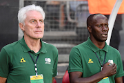 Bafana Bafana head coach Hugo Broos (elft) and assistant coach Helman Mkhalele during the 2023 Africa Cup of Nations qualifier match against Liberia at Orlando Stadium on March 24 2023.