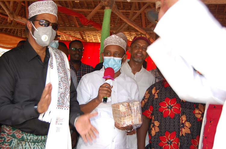 Garissa governor Ali Korane Korane and Eldas MP Aden Keynan during the funds drive