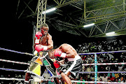 BIG PAYDAY: Xolisani Ndongeni, left, will eventually show his boxing skills beyond the borders of Africa. He has been signed by a US-based 
      
      company, Banner Promotion 
      PHOTO: SINO