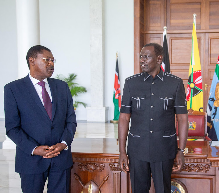 President William Ruto engages National Assembly Speaker Moses Wetang'ula after signing the Statute Law (Miscellaneous Amendments) Bill into law on April 24, 2024.