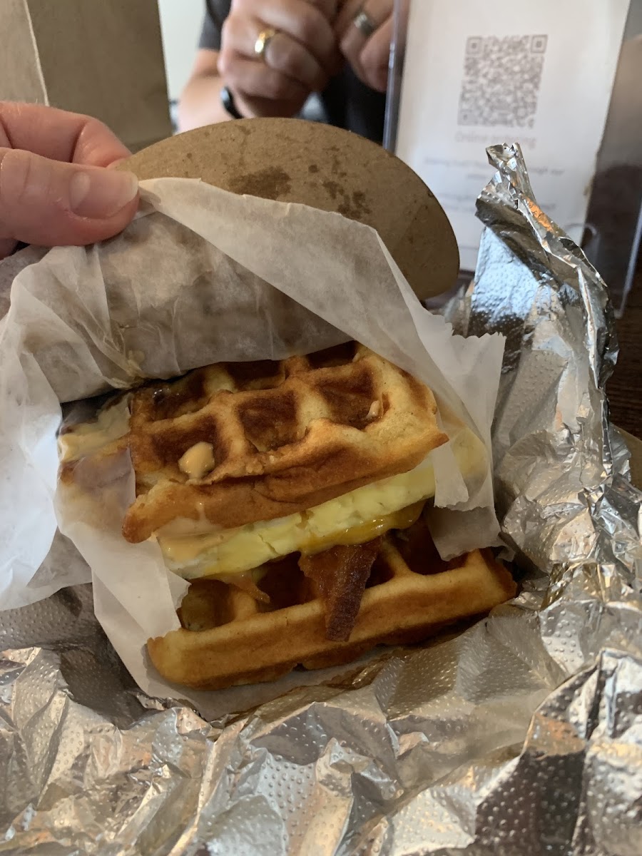 Breakfast sandwich. Gf waffles, egg, cheese, sausage, bacon, spicy mayo