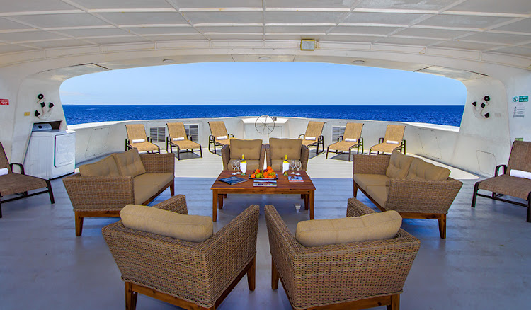 Indulge in comfort on the shaded deck of Treasure of Galapagos from Avalon Waterways.