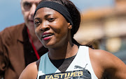 Tebogo Mamathu smiles after winning the women's 100m heat race during the Riunione Italiana di Velocità athletic meeting in Rieti, Italy. 