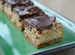 Almond Joy Bars was pinched from <a href="http://threemanycooks.com/recipes/sweet-treats/almond-joy-bars/" target="_blank">threemanycooks.com.</a>