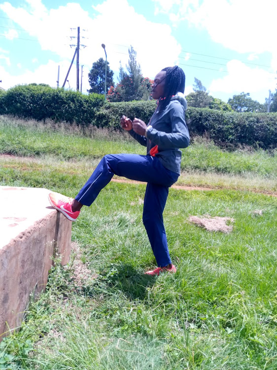 Mary Moraa keeping fit at her compound